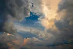 Majestic clouds illuminated by sunset light