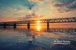 Amazing view to bridge across the Dnieper river, Cherkasy, Ukraine at sunset