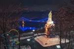 Scenic view of Saint Vladimir Monument against the backdrop of the Dnieper River at winter night, Kyiv, Ukraine