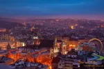 Aerial panoramic view of historical city center at night, Lviv, Ukraine. UNESCO world heritage site