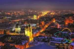 Aerial panoramic view of historical city center at night, Lviv, Ukraine. UNESCO world heritage site