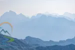 Scenic view of blue ridge in hazy mountains. Julian Alps