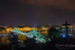 Scenic night scape of Budapest. Danube river and Freedom bridge in backlight