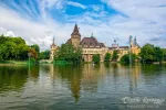 Scenic view of Vajdahunyad Castle reflected in the lake under the picturesque sky in main City Park, Budapest, Hungary