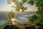 Sunrise over Danube river and Gellert hill park in Budapest