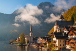 Scenic view of famous Hallstatt mountain village in the Alps under picturesque clouds at autumn morning