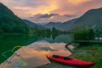Picturesque sky over reservoir on Soca river near Most na Soci, Slovenia at sunset