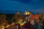 Scenic night scape of Hohnstein town with Hohnstein castle and neat timber framing houses in Saxon Switzerland, Germany